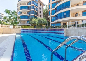 Садовый дуплекс 3+1 с видом на море в районе Каргыджак