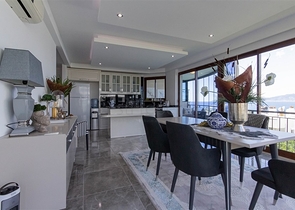 Садовый дуплекс 3+1 с видом на море в районе Каргыджак