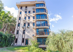 Садовый дуплекс 3+1 с видом на море в районе Каргыджак