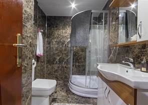 Садовый дуплекс 3+1 с видом на море в районе Каргыджак