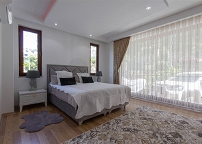 Садовый дуплекс 3+1 с видом на море в районе Каргыджак