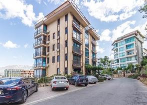 Садовый дуплекс 3+1 с видом на море в районе Каргыджак