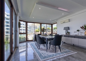 Садовый дуплекс 3+1 с видом на море в районе Каргыджак