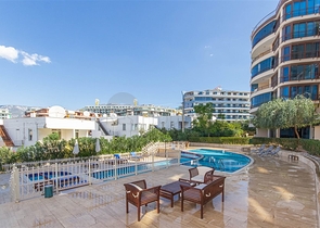 Садовый дуплекс 3+1 с видом на море в районе Каргыджак