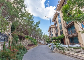 Садовый дуплекс 3+1 с видом на море в районе Каргыджак