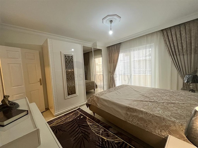 Меблированная трехкомнатная квартира в Махмутларе 