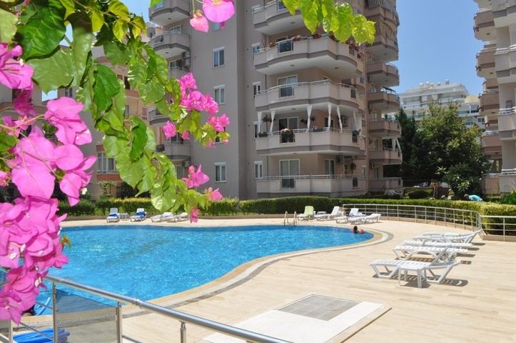 Меблированная трехкомнатная квартира в Махмутларе 