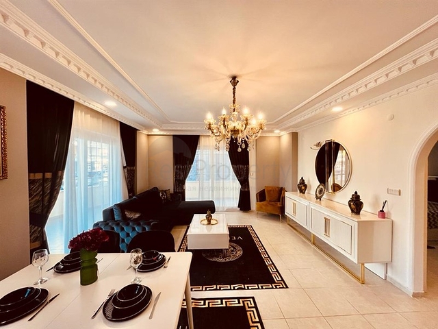 Меблированная трехкомнатная квартира в Махмутларе 