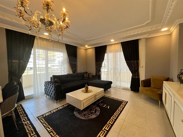 Меблированная трехкомнатная квартира в Махмутларе 