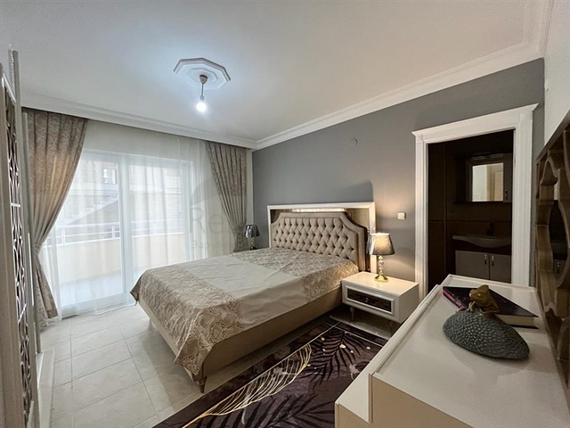 Меблированная трехкомнатная квартира в Махмутларе 