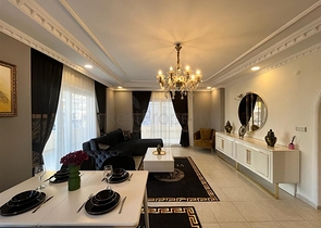 Меблированная трехкомнатная квартира в Махмутларе 