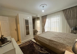 Меблированная трехкомнатная квартира в Махмутларе 