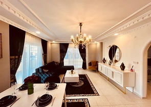 Меблированная трехкомнатная квартира в Махмутларе 