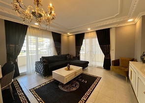 Меблированная трехкомнатная квартира в Махмутларе 