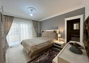 Меблированная трехкомнатная квартира в Махмутларе 