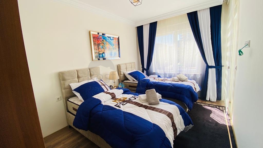 Трехкомнатная меблированная квартира с отдельной кухней в Махмутларе