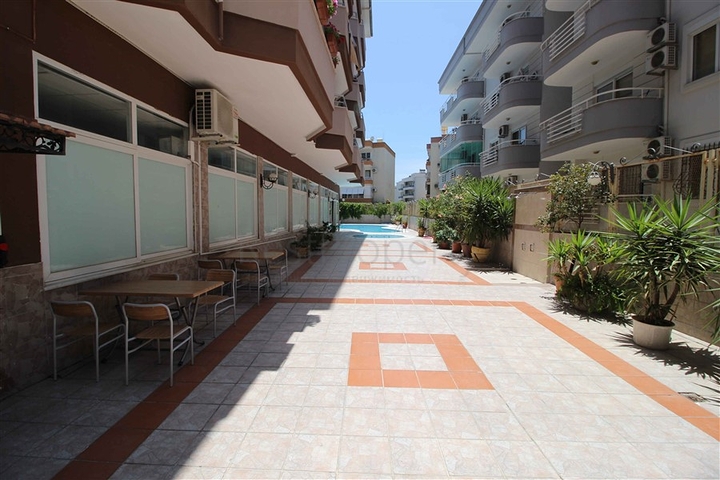 Меблированная квартира 1+1 в районе Оба в шаговой доступности от моря