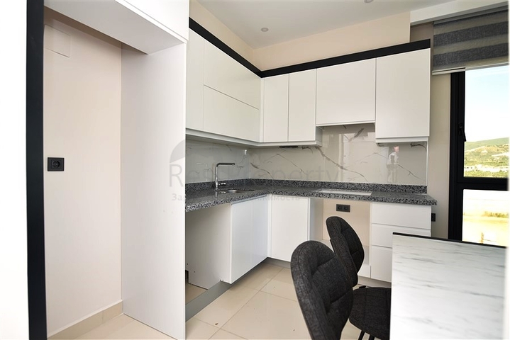 Квартира 1+1 в 200 м от пляжа в районе Каргыджак 