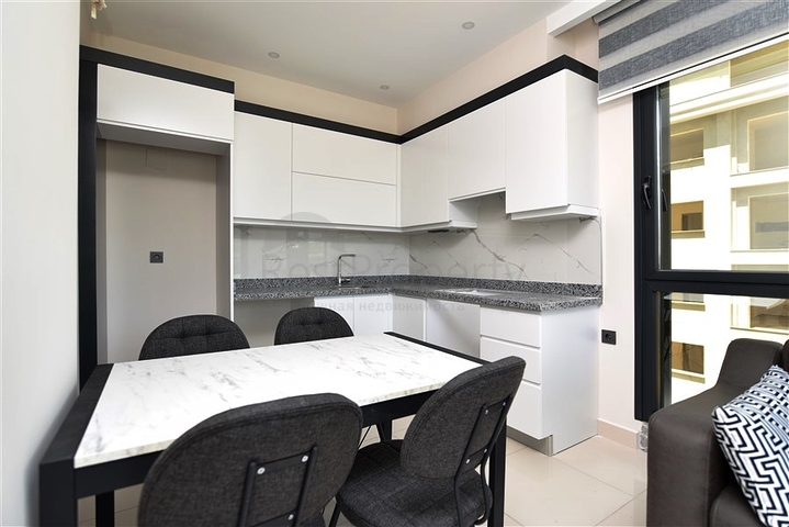 Квартира 1+1 в 200 м от пляжа в районе Каргыджак 