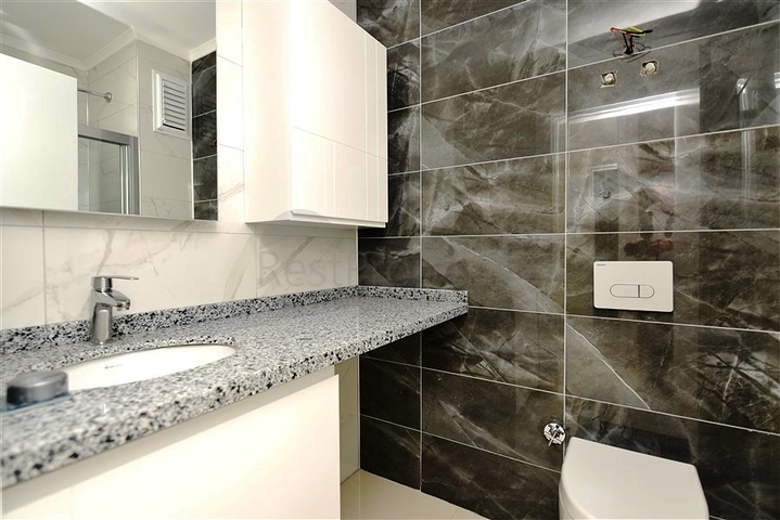 Квартира 1+1 в 200 м от пляжа в районе Каргыджак 