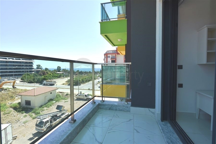 Квартира 1+1 в 200 м от пляжа в районе Каргыджак 