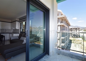 Квартира 1+1 в 200 м от пляжа в районе Каргыджак 