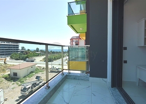 Квартира 1+1 в 200 м от пляжа в районе Каргыджак 