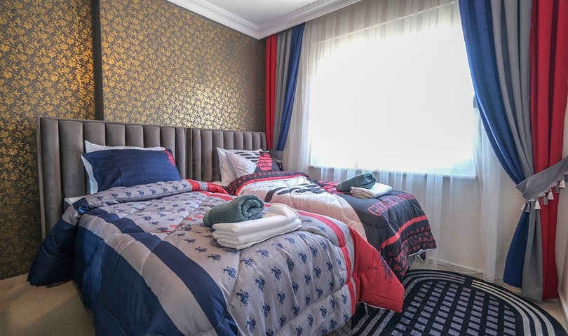 Трехкомнатная квартира в районе Махмутлар