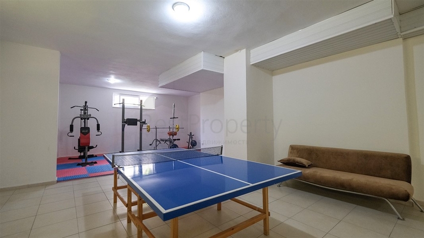 Трехкомнатная квартира в районе Махмутлар