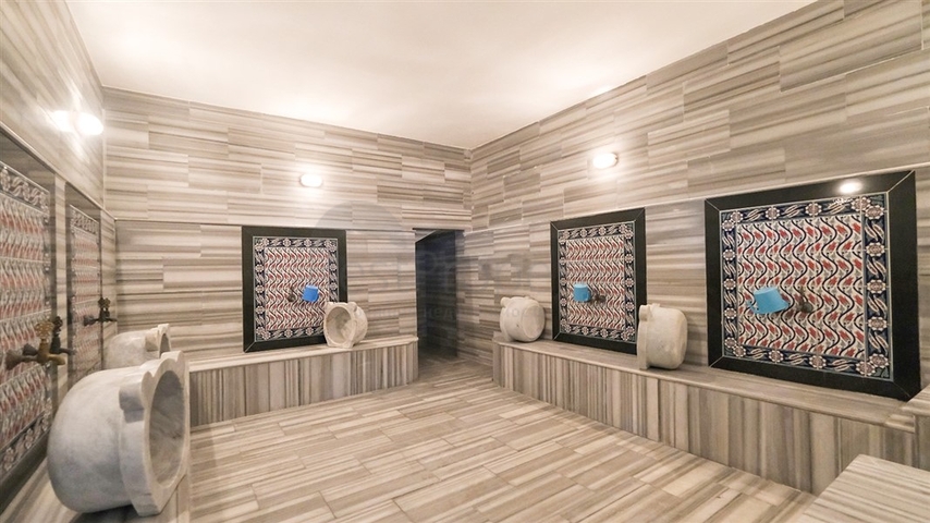 Трехкомнатная квартира в районе Махмутлар