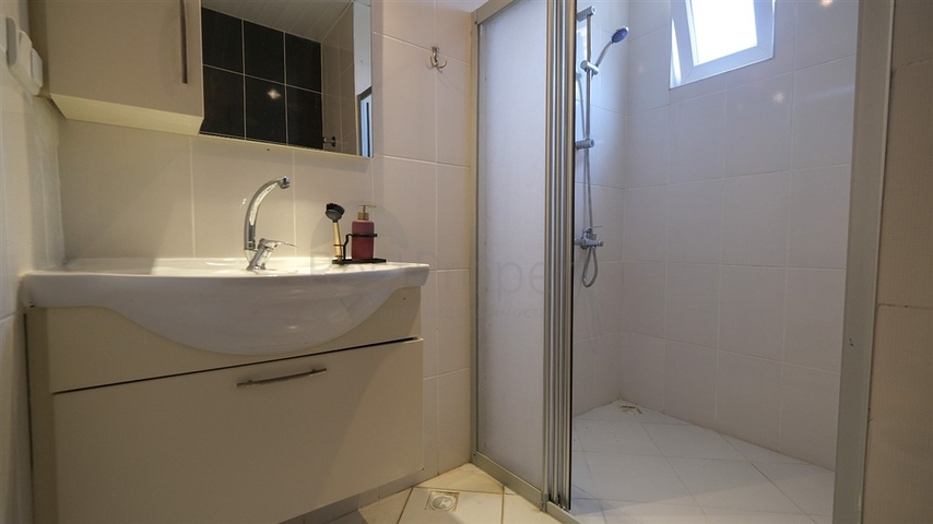 Трехкомнатная квартира в районе Махмутлар