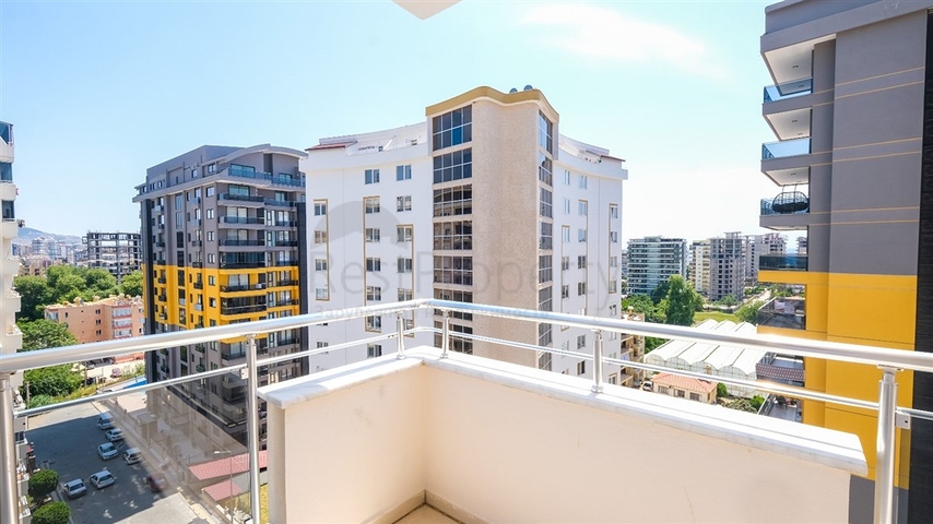 Трехкомнатная квартира в районе Махмутлар