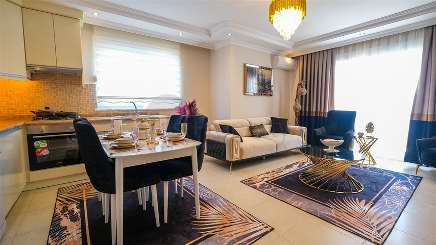 Трехкомнатная квартира в районе Махмутлар