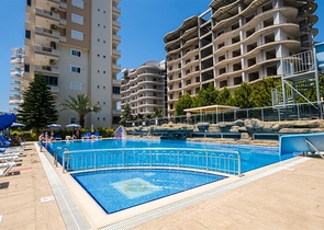 Трехкомнатная квартира в районе Махмутлар