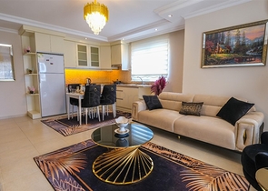 Трехкомнатная квартира в районе Махмутлар