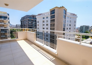 Трехкомнатная квартира в районе Махмутлар