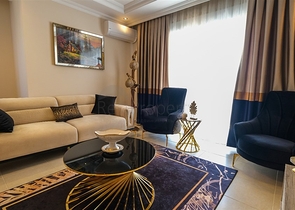 Трехкомнатная квартира в районе Махмутлар