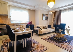 Трехкомнатная квартира в районе Махмутлар