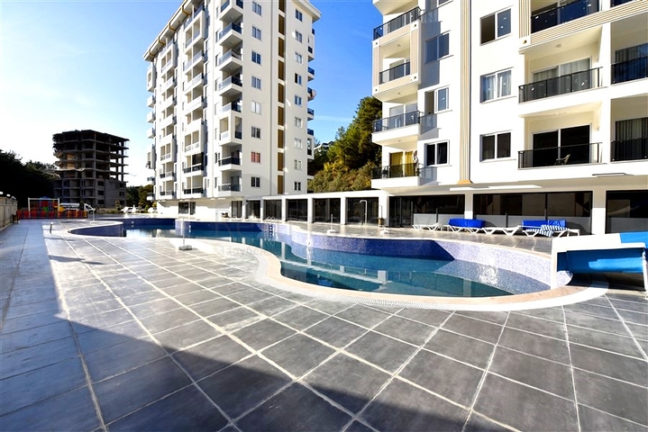 Квартира 1+1 в новом комплексе в районе Авсалар