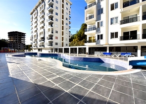 Квартира 1+1 в новом комплексе в районе Авсалар