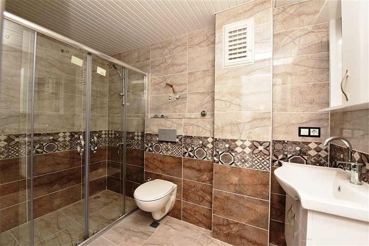 Пентхаус с видом на горы в районе Махмутлар