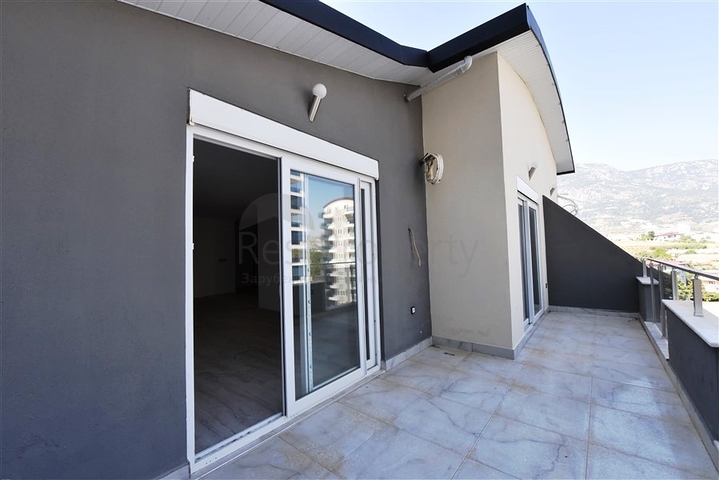 Пентхаус с видом на горы в районе Махмутлар