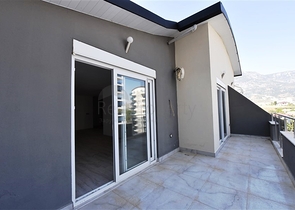 Пентхаус с видом на горы в районе Махмутлар