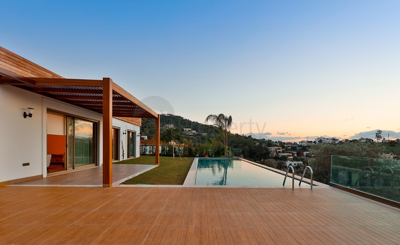 Виллы 5+1 с большим садом в центре Бодрума 