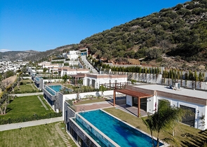 Виллы 5+1 с большим садом в центре Бодрума 