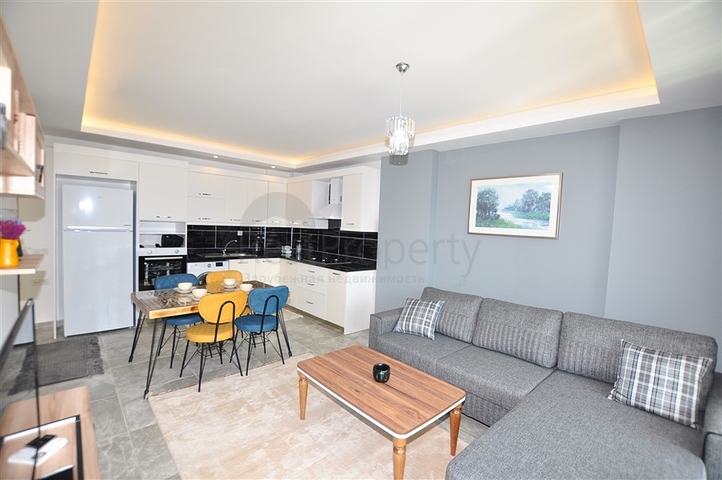 Меблированная квартира 1+1 с видом на хвойный лес в Каргыджак