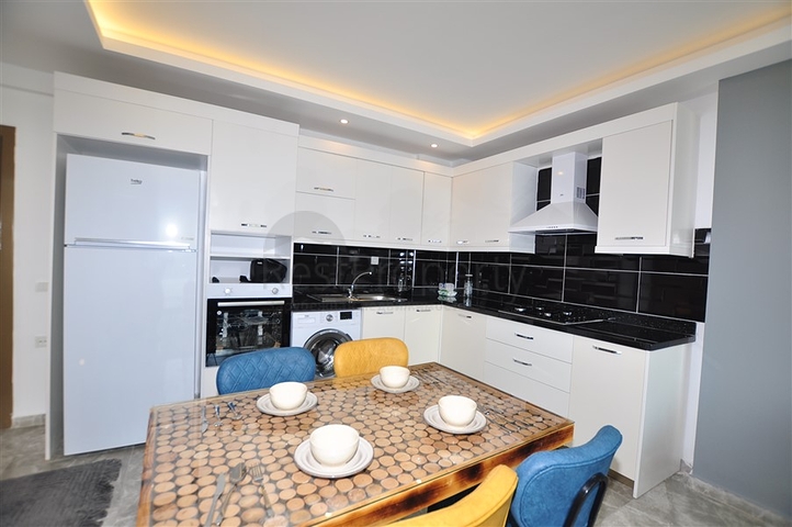 Меблированная квартира 1+1 с видом на хвойный лес в Каргыджак