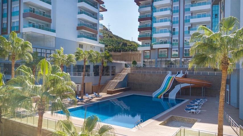 Меблированная квартира 1+1 с видом на хвойный лес в Каргыджак