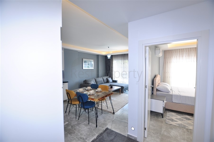 Меблированная квартира 1+1 с видом на хвойный лес в Каргыджак