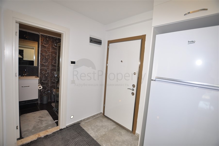 Меблированная квартира 1+1 с видом на хвойный лес в Каргыджак